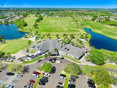 Viera East Golf Course Beauty! LIVE the easy lifestyle in this on  in Florida - for sale on GolfHomes.com, golf home, golf lot