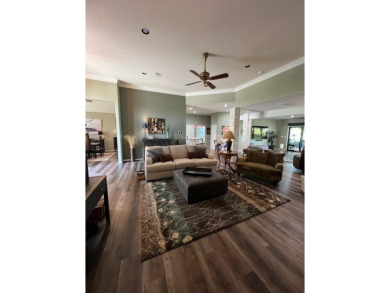 Nestled beneath an abundance of shade, located across the street on Legends Golf Course in Texas - for sale on GolfHomes.com, golf home, golf lot