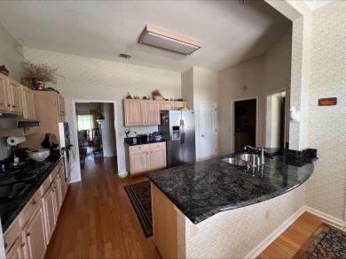 This stunning custom-built, all-brick home is ideally located on on Sawgrass Country Club  in Florida - for sale on GolfHomes.com, golf home, golf lot