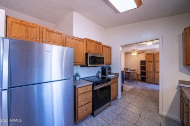 Do not miss this move-in ready GEM! This 3-bedroom home offers on Paradise Valley Park Golf Course in Arizona - for sale on GolfHomes.com, golf home, golf lot