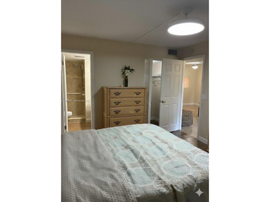 Elevated living meets total convenience in this charming on Sunrise Lakes Phase IV Golf Course in Florida - for sale on GolfHomes.com, golf home, golf lot