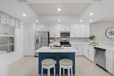 Elegant First-Floor Arabella Veranda with Stunning Upgrades on Heritage Landing Golf  in Florida - for sale on GolfHomes.com, golf home, golf lot
