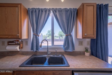 Do not miss this move-in ready GEM! This 3-bedroom home offers on Paradise Valley Park Golf Course in Arizona - for sale on GolfHomes.com, golf home, golf lot