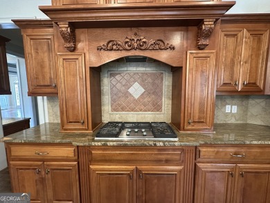 Welcome to 4345 Spring Branch Circle. This beautiful home is on Kinderlou Forest Golf Club in Georgia - for sale on GolfHomes.com, golf home, golf lot