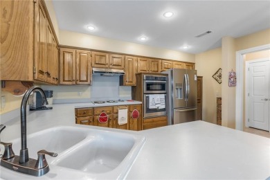 Nestled in a quiet cul-de-sac in a picturesque neighborhood on Springdale Country Club in Arkansas - for sale on GolfHomes.com, golf home, golf lot