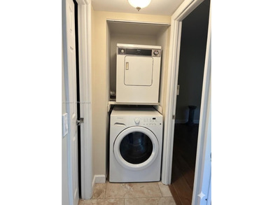 Elevated living meets total convenience in this charming on Sunrise Lakes Phase IV Golf Course in Florida - for sale on GolfHomes.com, golf home, golf lot