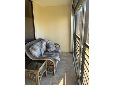 Comfort meets total convenience in this charming 2-bedroom on Sunrise Lakes Phase IV Golf Course in Florida - for sale on GolfHomes.com, golf home, golf lot