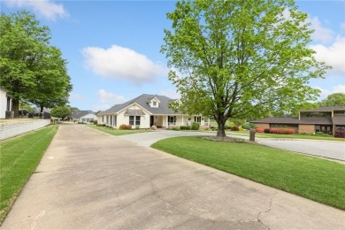 Nestled in a quiet cul-de-sac in a picturesque neighborhood on Springdale Country Club in Arkansas - for sale on GolfHomes.com, golf home, golf lot