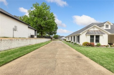 Nestled in a quiet cul-de-sac in a picturesque neighborhood on Springdale Country Club in Arkansas - for sale on GolfHomes.com, golf home, golf lot