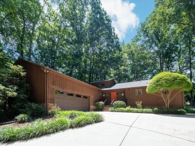 Beautifully updated three-bedroom ranch home nestled at the 14th on Westport Golf Club in North Carolina - for sale on GolfHomes.com, golf home, golf lot