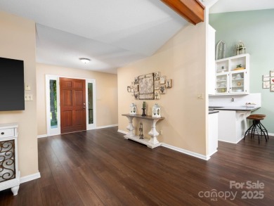 Beautifully updated three-bedroom ranch home nestled at the 14th on Westport Golf Club in North Carolina - for sale on GolfHomes.com, golf home, golf lot