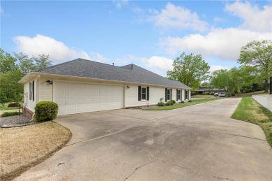 Nestled in a quiet cul-de-sac in a picturesque neighborhood on Springdale Country Club in Arkansas - for sale on GolfHomes.com, golf home, golf lot