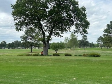 Nestled in a quiet cul-de-sac in a picturesque neighborhood on Springdale Country Club in Arkansas - for sale on GolfHomes.com, golf home, golf lot