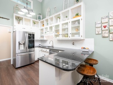 Beautifully updated three-bedroom ranch home nestled at the 14th on Westport Golf Club in North Carolina - for sale on GolfHomes.com, golf home, golf lot