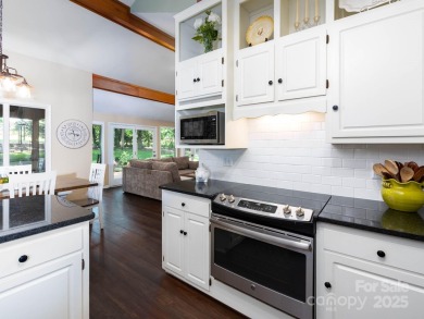 Beautifully updated three-bedroom ranch home nestled at the 14th on Westport Golf Club in North Carolina - for sale on GolfHomes.com, golf home, golf lot