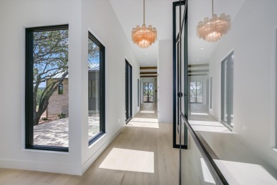 Single level residence with a ton of natural light located on on Summit Rock Golf Course in Texas - for sale on GolfHomes.com, golf home, golf lot