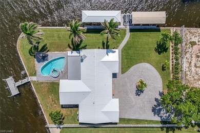 Coastal Waterfront Retreat with Panoramic Estero Bay Views & on Fort Myers Beach and Golf Club in Florida - for sale on GolfHomes.com, golf home, golf lot