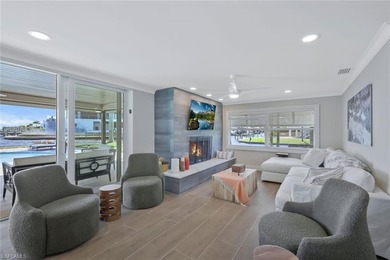 Coastal Waterfront Retreat with Panoramic Estero Bay Views & on Fort Myers Beach and Golf Club in Florida - for sale on GolfHomes.com, golf home, golf lot