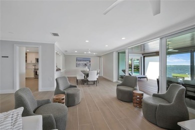 Coastal Waterfront Retreat with Panoramic Estero Bay Views & on Fort Myers Beach and Golf Club in Florida - for sale on GolfHomes.com, golf home, golf lot