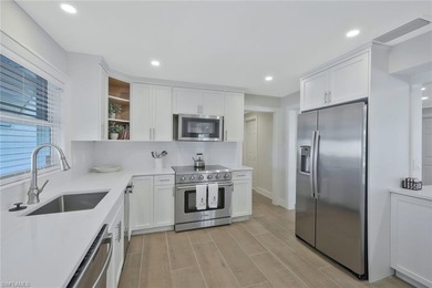 Coastal Waterfront Retreat with Panoramic Estero Bay Views & on Fort Myers Beach and Golf Club in Florida - for sale on GolfHomes.com, golf home, golf lot