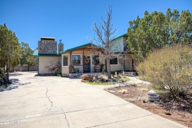 Truly one-of-a-kind home with lake rights in the highly on Juniper Ridge R.V. Golf Resort in Arizona - for sale on GolfHomes.com, golf home, golf lot