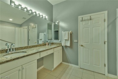 TERRIFIC LOCATION WITH CENTER OF LAKE VIEWS FOR THIS UPDATED on Colonial Country Club in Florida - for sale on GolfHomes.com, golf home, golf lot