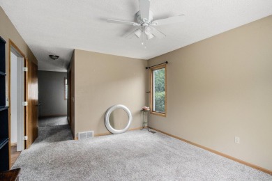 This spacious home has panoramic views of the 14th hole on on Lake Doster Golf Club in Michigan - for sale on GolfHomes.com, golf home, golf lot