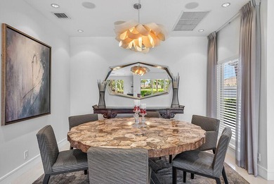 This serene house is situated on a picturesque golf course on Delaire Golf and Country Club in Florida - for sale on GolfHomes.com, golf home, golf lot