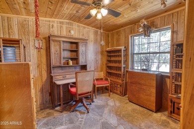 Truly one-of-a-kind home with lake rights in the highly on Juniper Ridge R.V. Golf Resort in Arizona - for sale on GolfHomes.com, golf home, golf lot