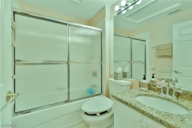 TERRIFIC LOCATION WITH CENTER OF LAKE VIEWS FOR THIS UPDATED on Colonial Country Club in Florida - for sale on GolfHomes.com, golf home, golf lot