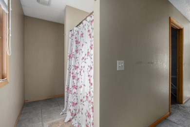 This spacious home has panoramic views of the 14th hole on on Lake Doster Golf Club in Michigan - for sale on GolfHomes.com, golf home, golf lot