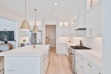 Welcome to your ideal coastal retreat! This beautiful 1.5 story on Crow Creek Golf Club in North Carolina - for sale on GolfHomes.com, golf home, golf lot