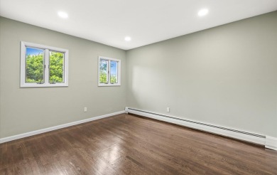 Welcome to this stunning, renovated Hi-Ranch in the heart of on Peninsula Golf Club in New York - for sale on GolfHomes.com, golf home, golf lot