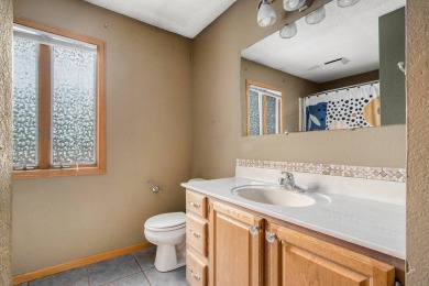 This spacious home has panoramic views of the 14th hole on on Lake Doster Golf Club in Michigan - for sale on GolfHomes.com, golf home, golf lot
