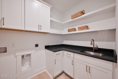 Welcome to your ideal coastal retreat! This beautiful 1.5 story on Crow Creek Golf Club in North Carolina - for sale on GolfHomes.com, golf home, golf lot