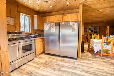 Truly one-of-a-kind home with lake rights in the highly on Juniper Ridge R.V. Golf Resort in Arizona - for sale on GolfHomes.com, golf home, golf lot