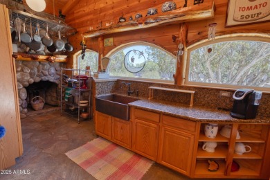 Truly one-of-a-kind home with lake rights in the highly on Juniper Ridge R.V. Golf Resort in Arizona - for sale on GolfHomes.com, golf home, golf lot