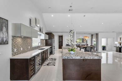 This serene house is situated on a picturesque golf course on Delaire Golf and Country Club in Florida - for sale on GolfHomes.com, golf home, golf lot