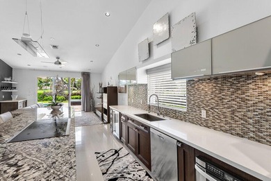 This serene house is situated on a picturesque golf course on Delaire Golf and Country Club in Florida - for sale on GolfHomes.com, golf home, golf lot