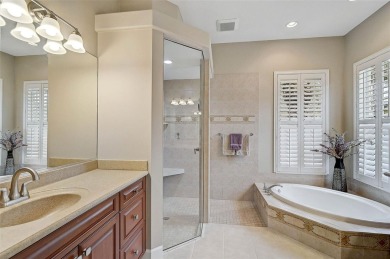 Indulge in your own private sanctuary at Pelican Pointe Golf on Pelican Pointe Golf and Country Club in Florida - for sale on GolfHomes.com, golf home, golf lot