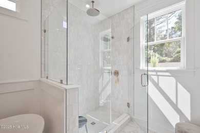 Welcome to your ideal coastal retreat! This beautiful 1.5 story on Crow Creek Golf Club in North Carolina - for sale on GolfHomes.com, golf home, golf lot