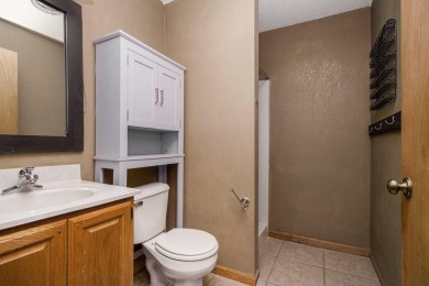 This spacious home has panoramic views of the 14th hole on on Lake Doster Golf Club in Michigan - for sale on GolfHomes.com, golf home, golf lot