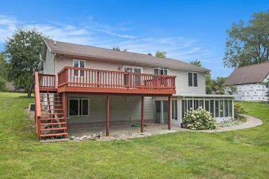 This spacious home has panoramic views of the 14th hole on on Lake Doster Golf Club in Michigan - for sale on GolfHomes.com, golf home, golf lot