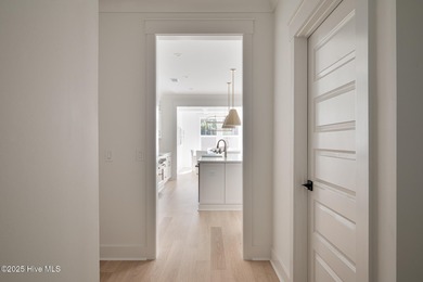 Welcome to your ideal coastal retreat! This beautiful 1.5 story on Crow Creek Golf Club in North Carolina - for sale on GolfHomes.com, golf home, golf lot