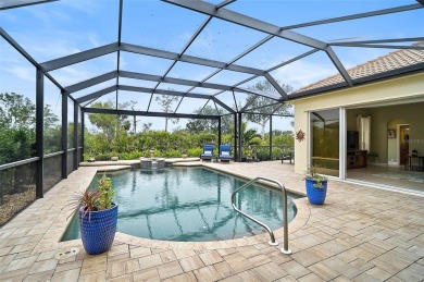 Indulge in your own private sanctuary at Pelican Pointe Golf on Pelican Pointe Golf and Country Club in Florida - for sale on GolfHomes.com, golf home, golf lot