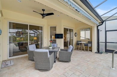 Indulge in your own private sanctuary at Pelican Pointe Golf on Pelican Pointe Golf and Country Club in Florida - for sale on GolfHomes.com, golf home, golf lot