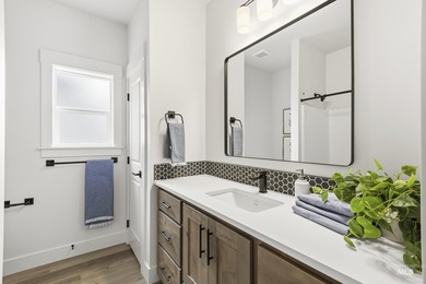 Thoughtfully designed single-level floor plan offers 3 bedrooms on Hunters Point Golf Club in Idaho - for sale on GolfHomes.com, golf home, golf lot