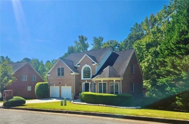 Experience refined living as this stately brick residence is on Southland Country Club in Georgia - for sale on GolfHomes.com, golf home, golf lot