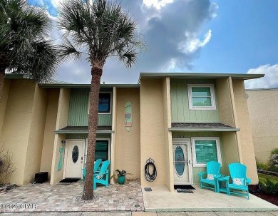 Your Coastal Oasis Awaits at 153 Gulf Highlands Blvd! STOP on Edgewater Beach Resort in Florida - for sale on GolfHomes.com, golf home, golf lot