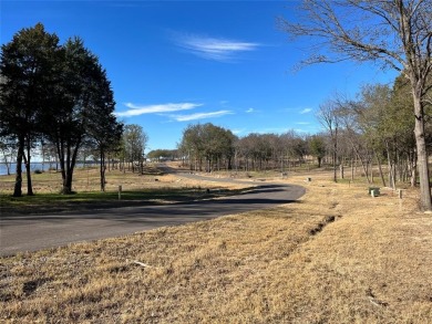 This is a .64 Acre lot with lake view, not a house. Cedar Creek on Cedar Creek Country Club in Texas - for sale on GolfHomes.com, golf home, golf lot